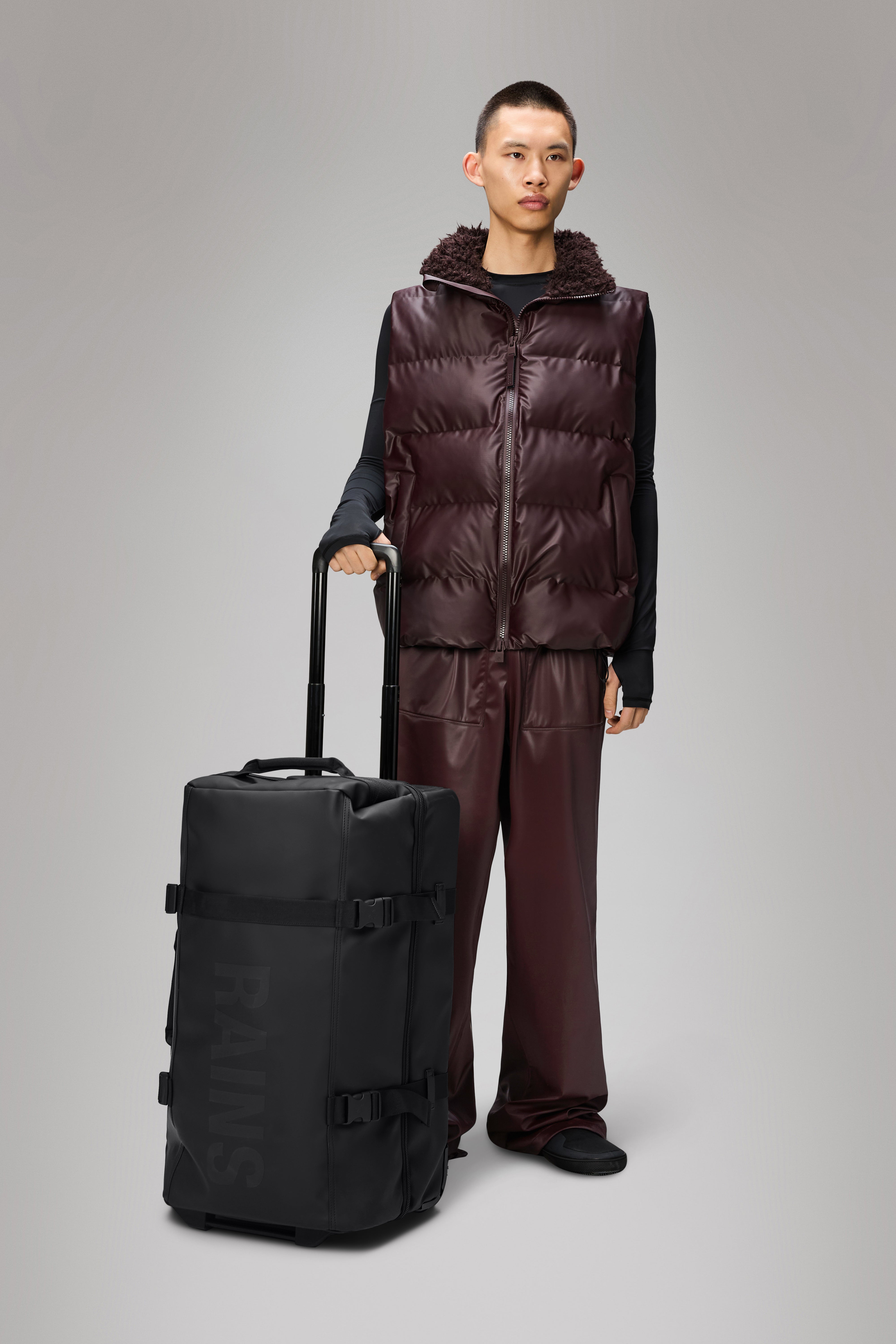 RAINS Texel Check-in Bag Black 62L H66 x D29 x W40 cm Trolley