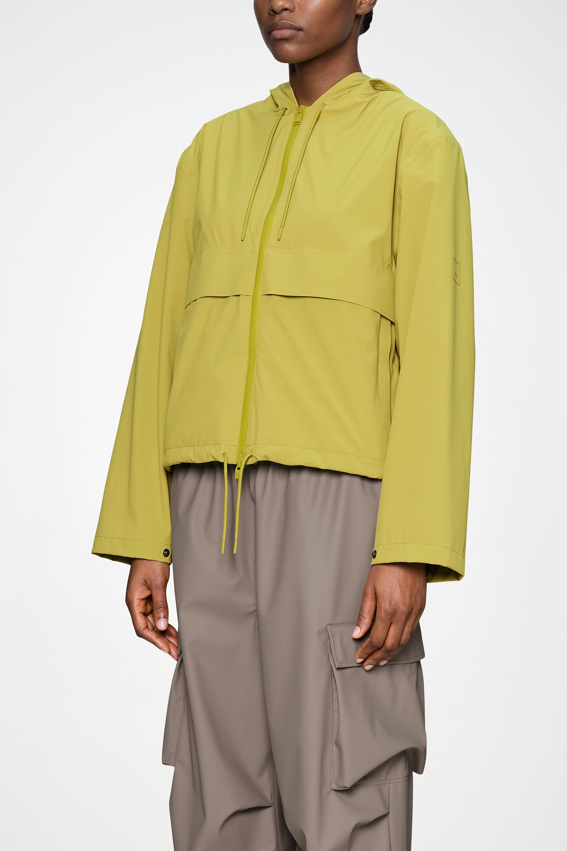 RAINS Suva Hardshell Short String W Jacket Glow Jacket