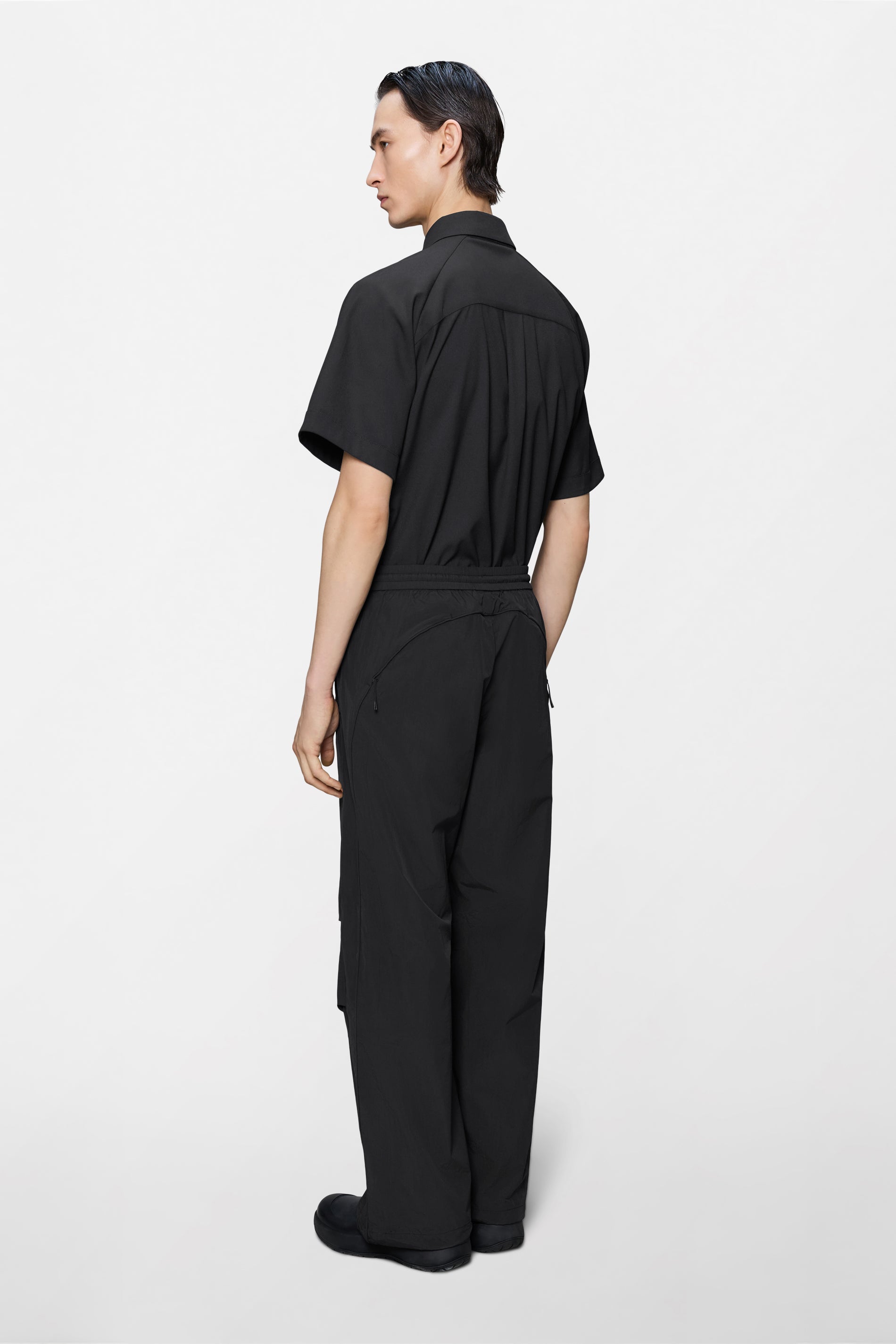 RAINS Cooldown Track Pants Black Pants